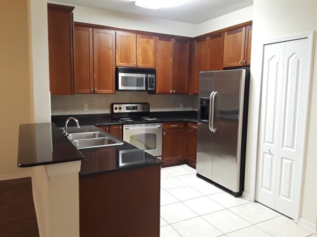 Building Photo - 9333 Stone River Place