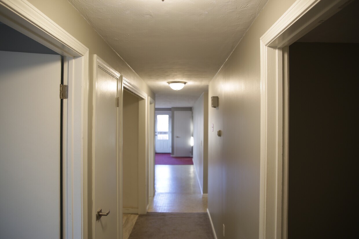 Hallway with closet washer dryer hook up - 584 Elm St