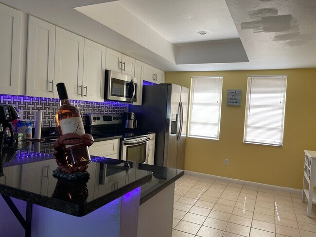 Full kitchen with all appliances and cooking equipment - 4836 Tudor Dr
