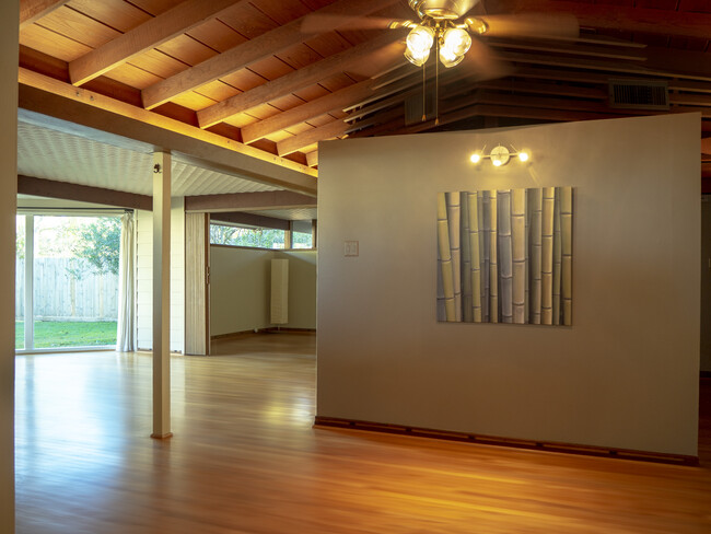 Dining area with vaulted wood ceiling. - 7601 Janak Dr