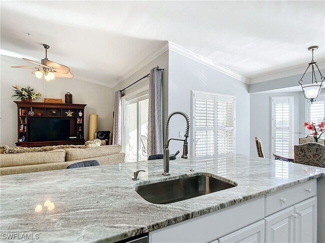 Foto del edificio - 10401 McArthur Palms Ln