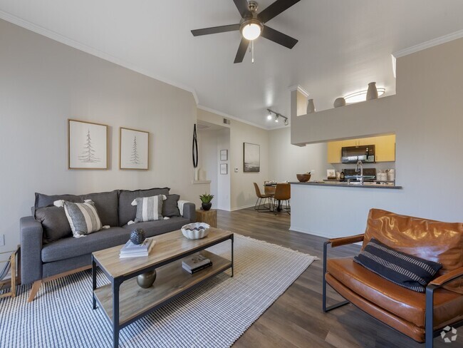 Living Room with Ceiling Fan - Indigo Creek Apartments