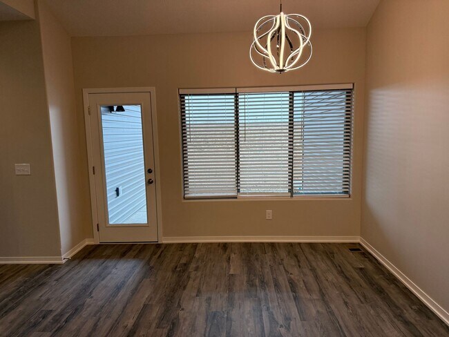 Building Photo - Walkout ranch townhome with 2 stall garage...