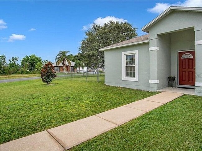 Building Photo - SINGLE FAMILY HOME IN POINCIANA 3/2