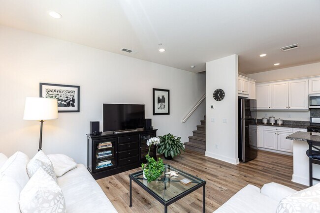 Building Photo - STUNNING TOWNHOME 3/2.5 WITH TWO CAR GARAG...