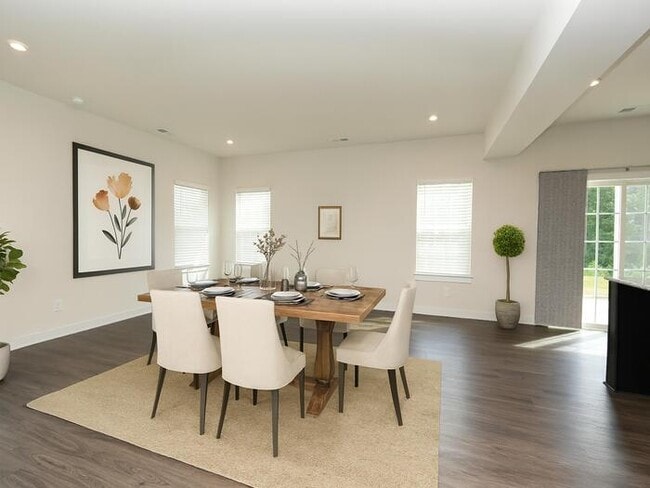 Building Photo - This wonderful home has a covered rocking chair front porch