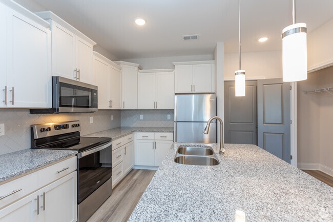 2BR, 2BA - 1081SF Osprey - Kitchen - Palisades at Lewis Creek Apartments