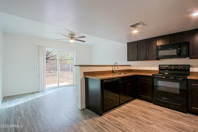 Building Photo - 5641 S Jacaranda Rd