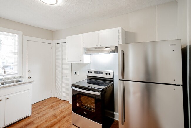 Building Photo - NOW OFFERING HALF OFF THE FIRST FULL MONTH...