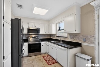 Building Photo - 8960 Manion Dr