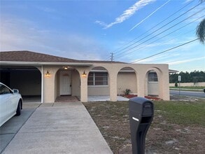 Building Photo - 5945 Mockingbird Dr