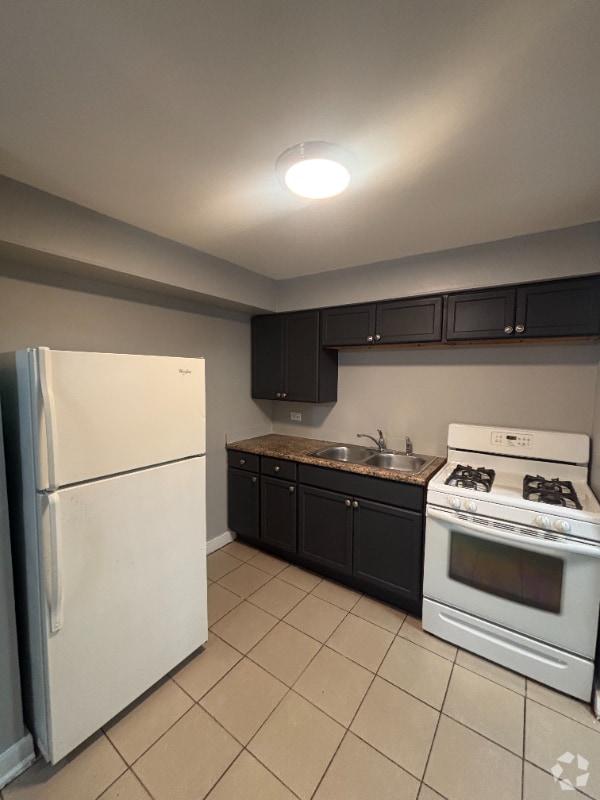Building Photo - 6435-6437 S Evans Ave