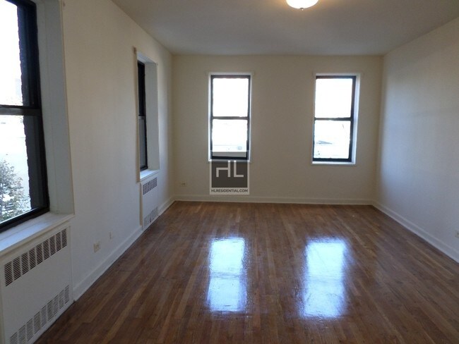 Building Photo - 37-10-37-76 76th St