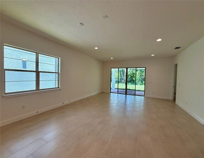 Building Photo - 5211 Buttonsage Dr