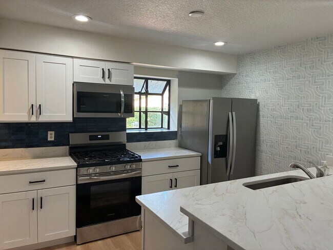 Foto del edificio - Discover Your Perfect Orlando Home with Ga...