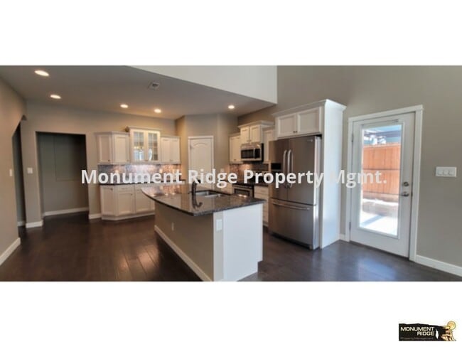 Building Photo - Available Now! Beautiful Four Bedroom Copp...