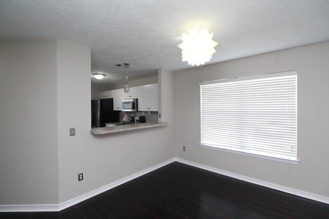 Building Photo - Spacious 3BR/2BA Navarre Home with Garage, Open Kitchen Layout, Fenced Yard & Convenient Coastal ...
