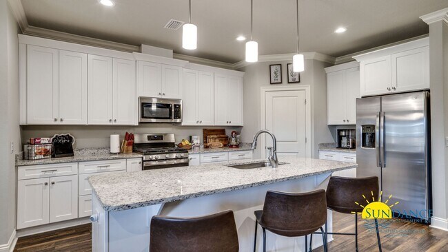Building Photo - Stunning 4BR Home with Community Beach Access & Sound Views!
