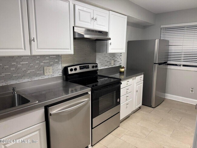 Foto del edificio - 11648 Dunes Way Dr N