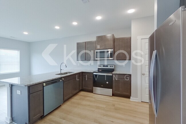 Foto del edificio - 6103 Stonewater Ct