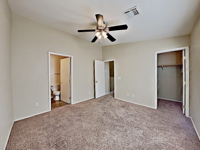 Building Photo - 5920 Trickling Descent St Unit 102