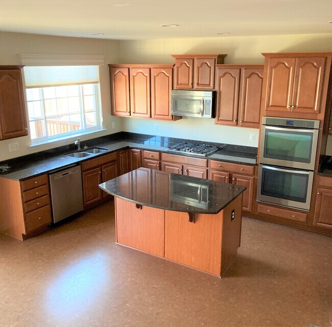 Cocina reformada - 8 Lamplighter Ln