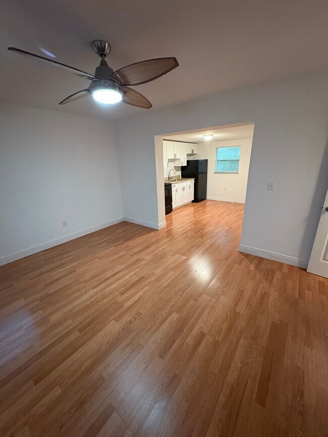 View from the main room into the kitchen - 10918 N Hyacinth Ave