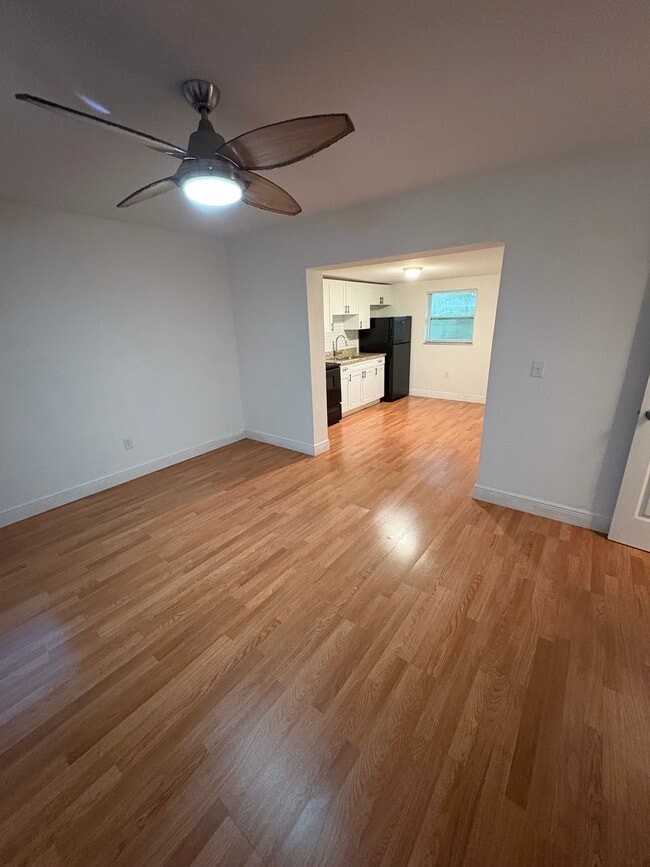 View from the main room into the kitchen - 10918 N Hyacinth Ave