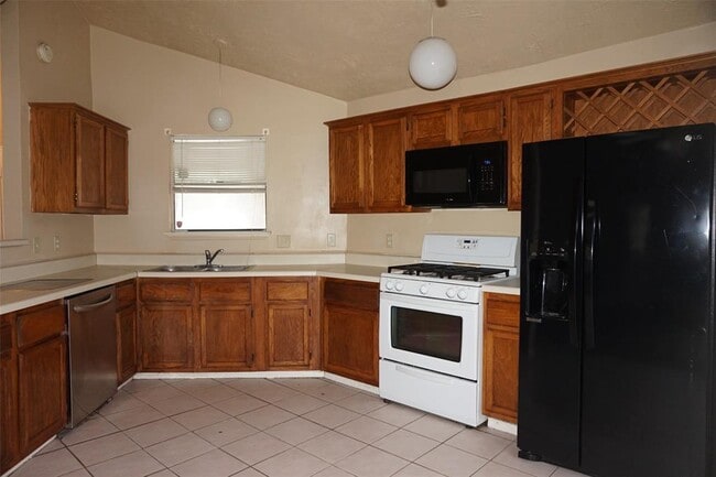 Building Photo - 6023 Woodmancote Dr