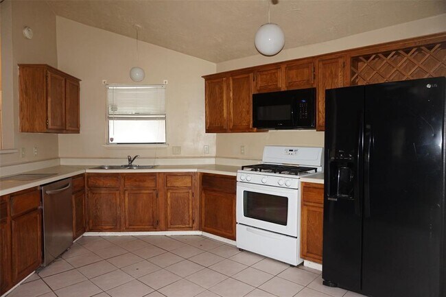 Foto del edificio - 6023 Woodmancote Dr