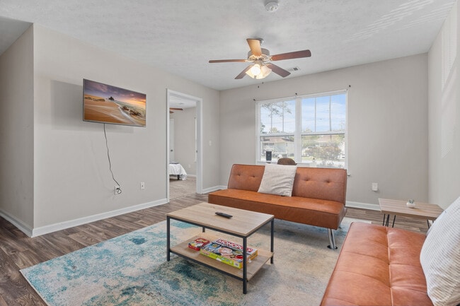 LEGENDS 2 BR | 2 BA - Living Room View from the dining area - Legends at Armour Avenue
