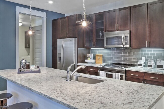 Foto del edificio - Your Dream Home: One Bedroom Apartments Ta...
