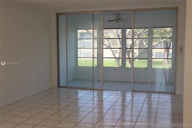 Building Photo - 6070 NW 64th Ave
