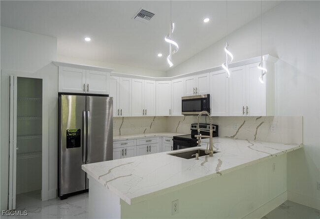 Foto del edificio - 4935 Leonard Blvd S