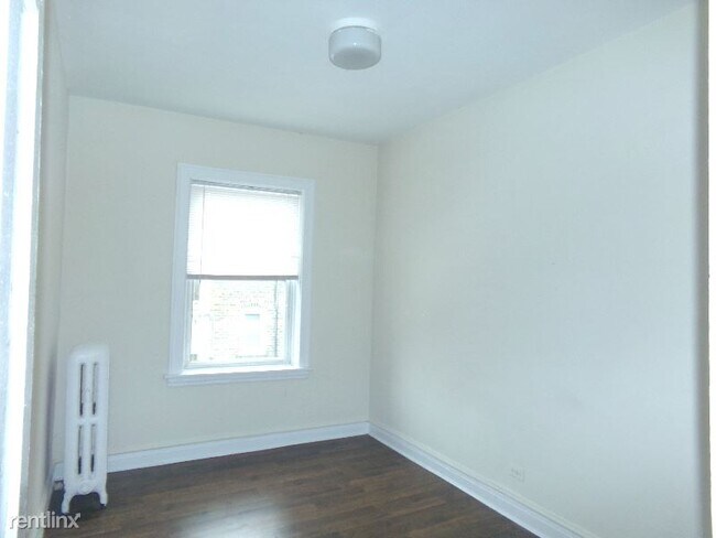 Building Photo - 6916 N Lakewood Ave