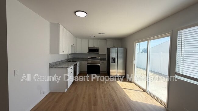 Building Photo - 78601 Ave 42