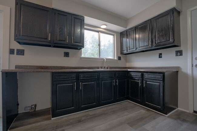 Building Photo - Must see FOUR bedroom Trilevel home