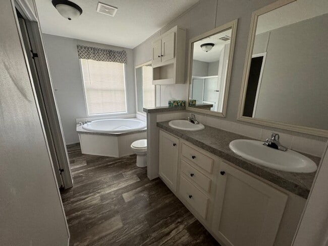 Building Photo - Beautiful 3/2 Mobile Home w/ Lawn Maintenance Included