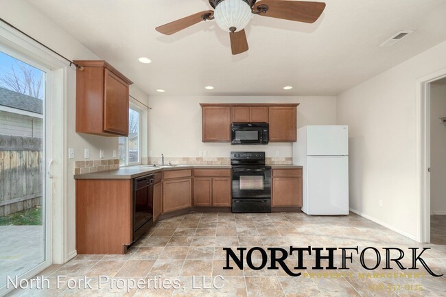 Building Photo - 3 br, 2.5 bath House - 5523 South Moonfire...