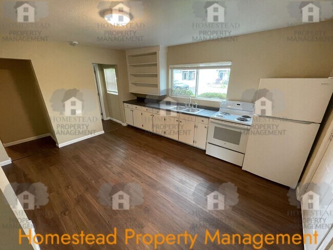 Foto del edificio - 219-219 1/2 S Monmouth Ave