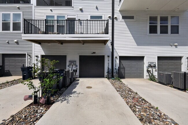 Building Photo - Stunning 2-Level Top Floor Condo with Tesla Charger & 70" TV – Farmstead District
