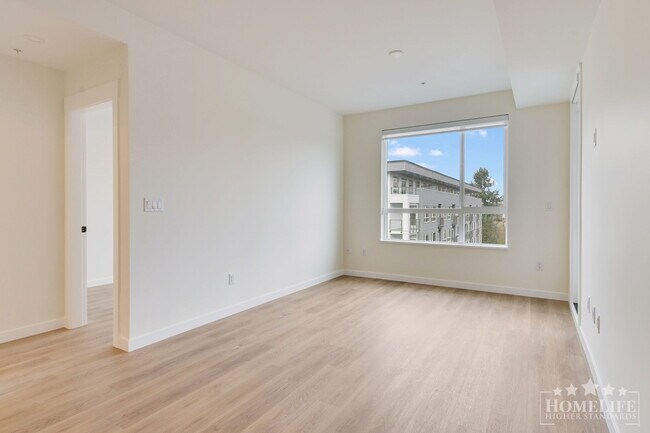 Building Photo - Modern 2-Bedroom, 2-Bath Condo at Aldergrove Town Centre – Jackman Building