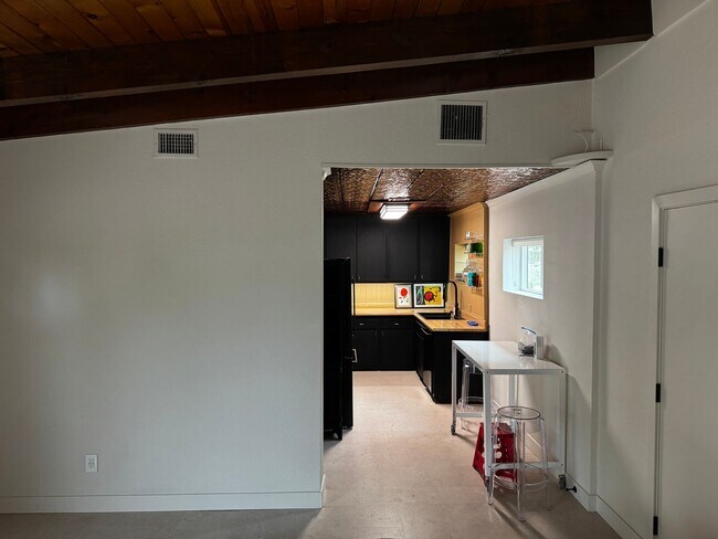 Building Photo - Mid-Century details in every corner. Solar panels! Gorgeous and perfect.