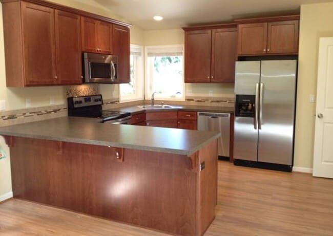 Kitchen with all stainless appliances - 15008 111th Ave NE