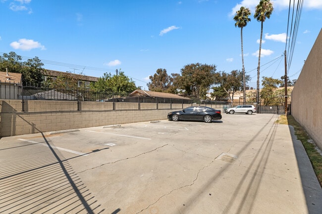 TWO PARKING SPACES PER UNIT MARKED BY UNIT LETTER - 9226 Palm St