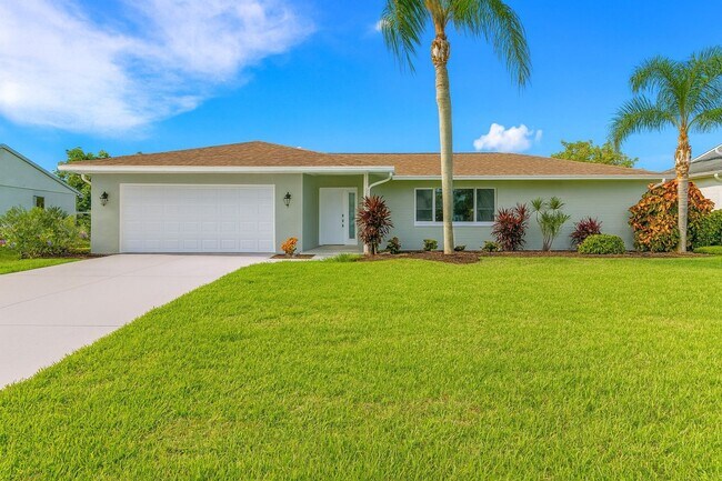Building Photo - Elegant 3-Bedroom Pool Home in the Prestigious 8 Lakes Area of SW Cape Coral!