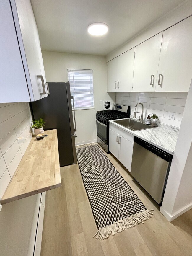 Building Photo - Available now! Fully renovated 2 bedroom, ...