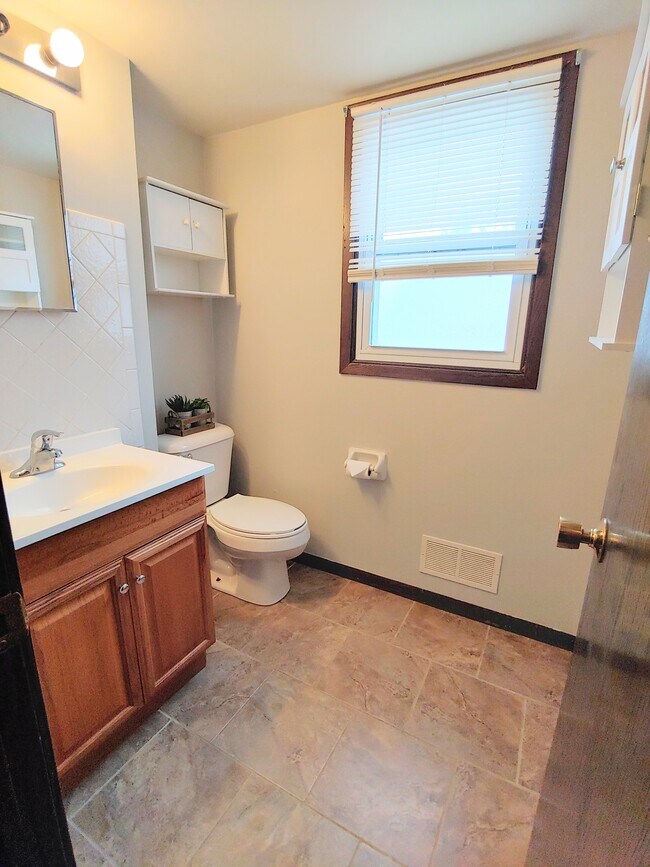 Half bathroom on first floor. - W158N11055 Legend Ave