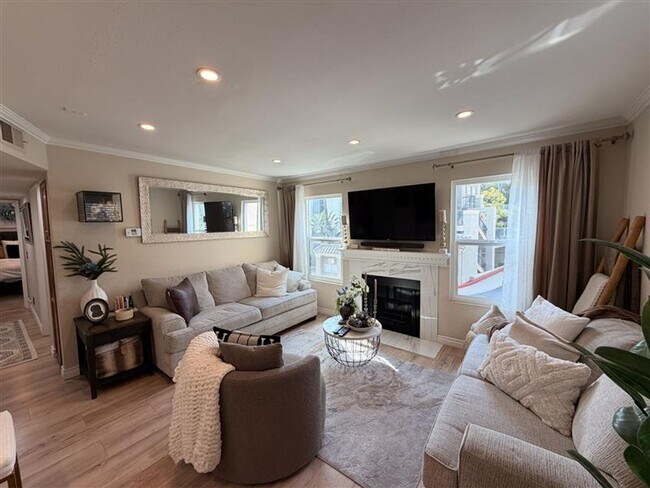 Building Photo - Recently Renovated Gated Long Beach Condo with Washer/Dryer, A/C, Pool, Gym, and 3 Parking Options