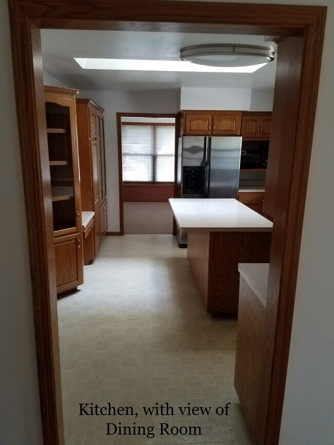 Kitchen w view into Dining Room - 1010 N Gammon Rd